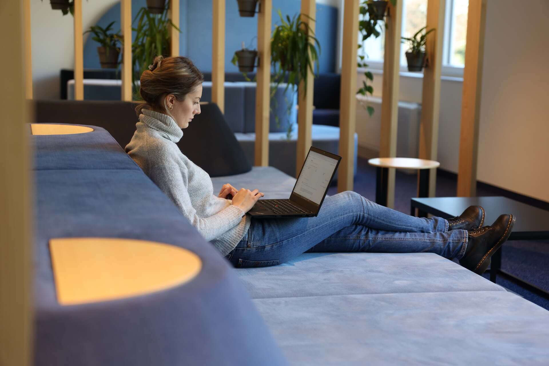 A Tractive employee working at the new office